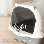 Covered cat litter box displayed with matching hanging scoop