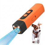 dog deterrent pictured with charging cable and instruction manual