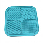 Dog lick mat showing suction cups underneath the silicone pad