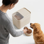 PAWZINA storage bin filled with dry pet food beneath the transparent lid