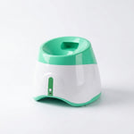 Close-up of the ball-loading opening on the PAWZINA fetch machine