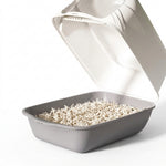 Semi-transparent paw-print door on the gray cat litter box
