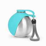 A portable insulated water bottle with a metallic silver body, a bright turquoise silicone sleeve and lid, and a gray braided carrying strap with a black clip, shown on a clean white background.