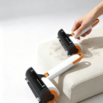 Reusable lint roller removing visible pet hair from clothing