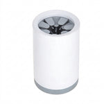 Dog paw placed inside the portable paw-washer cup